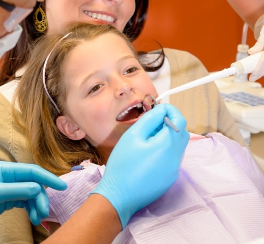 young girl undergoing dental treatment