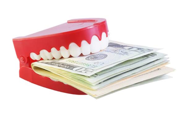 graphic of toy teeth holding wad of cash