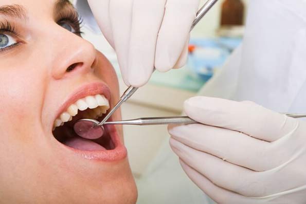 woman undergoing dental treatment