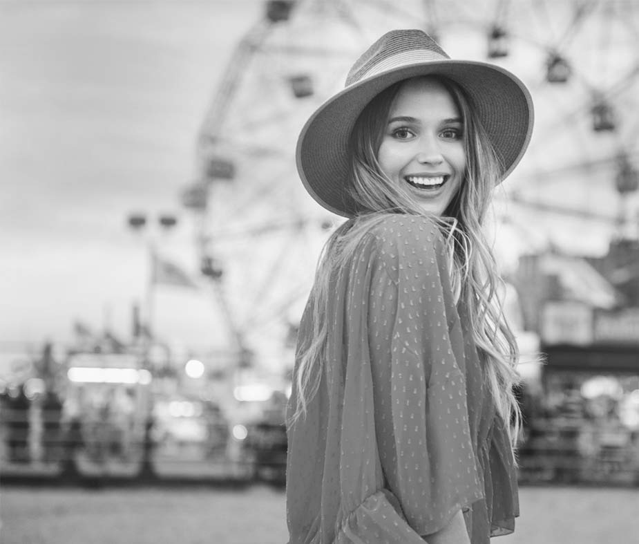 young woman smiling at fair