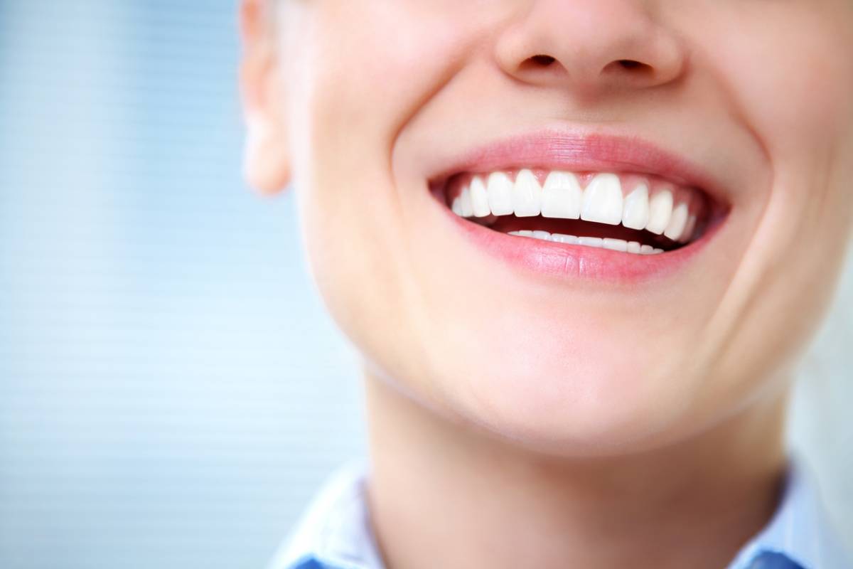 concept of smile after speed up tooth extraction healing